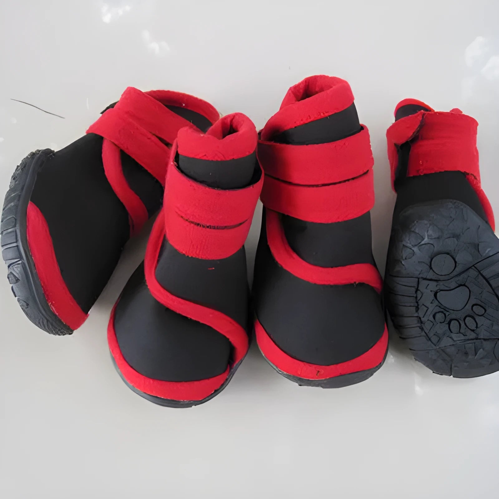 Pet dog shoes in blue with neoprene upper and beef tendon bottom, side view showing size and colour