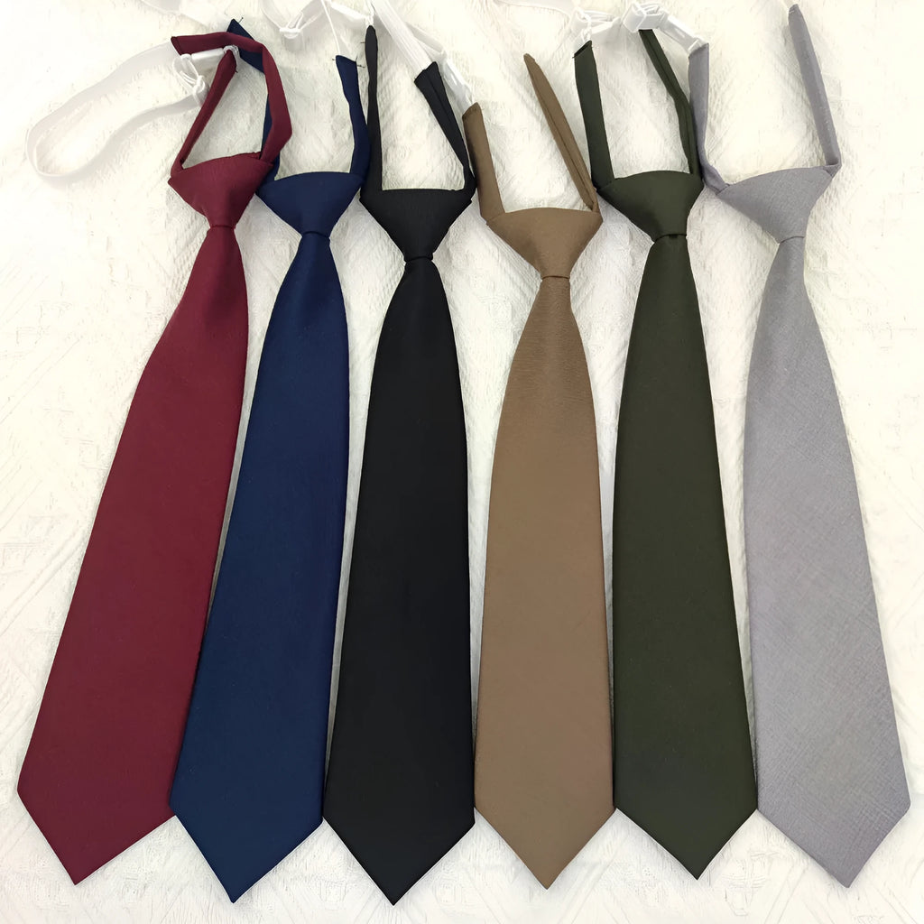 Men's solid navy blue cotton bow tie showing arrow-type design and dimensions