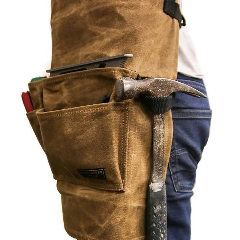 Yellow leather webbing apron in coated canvas, adjustable fit for men and women, with tool storage.