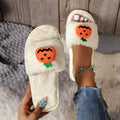 White and yellow pumpkin plush open toe slippers with synthetic fur uppers and PVC soles