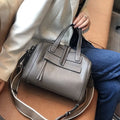 Genuine cowhide leather messenger bag with lychee pattern texture in horizontal square shape showing internal compartments
