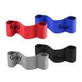 A black elastic bandage wrapped around an elbow, showing its adjustable fit for sports protection.