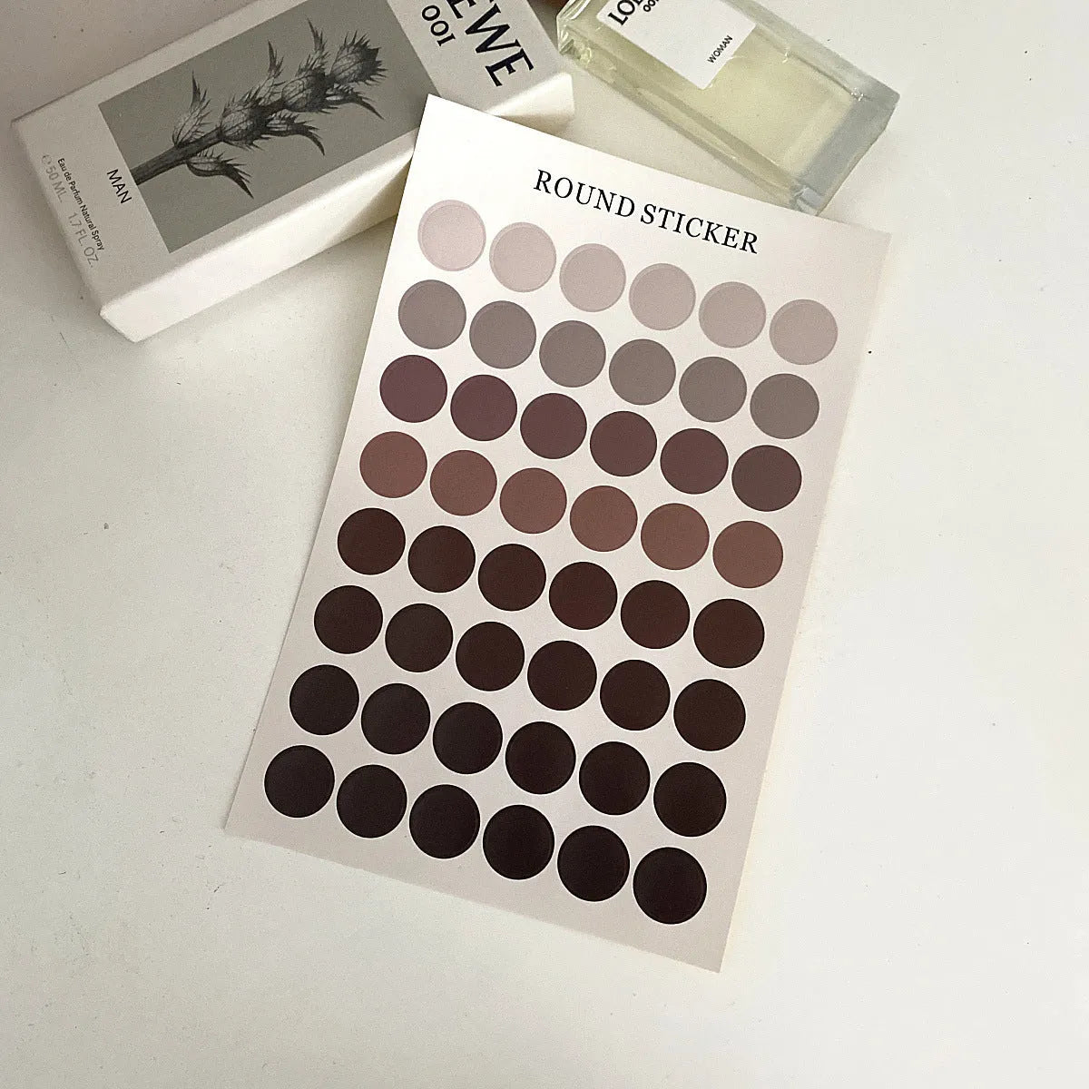 Sheet of 48 Morandi earth colour polka dot seal stickers, each 2cm diameter, on a 16x24.5cm sheet