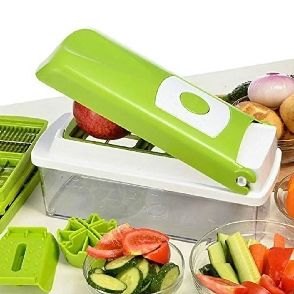 Green handheld manual food chopper with stainless steel blades on a white background.