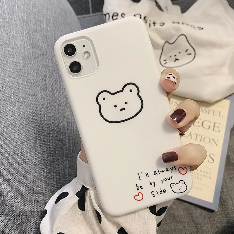 Silicone iPhone case with Korean bear cartoon design showing back and side coverage
