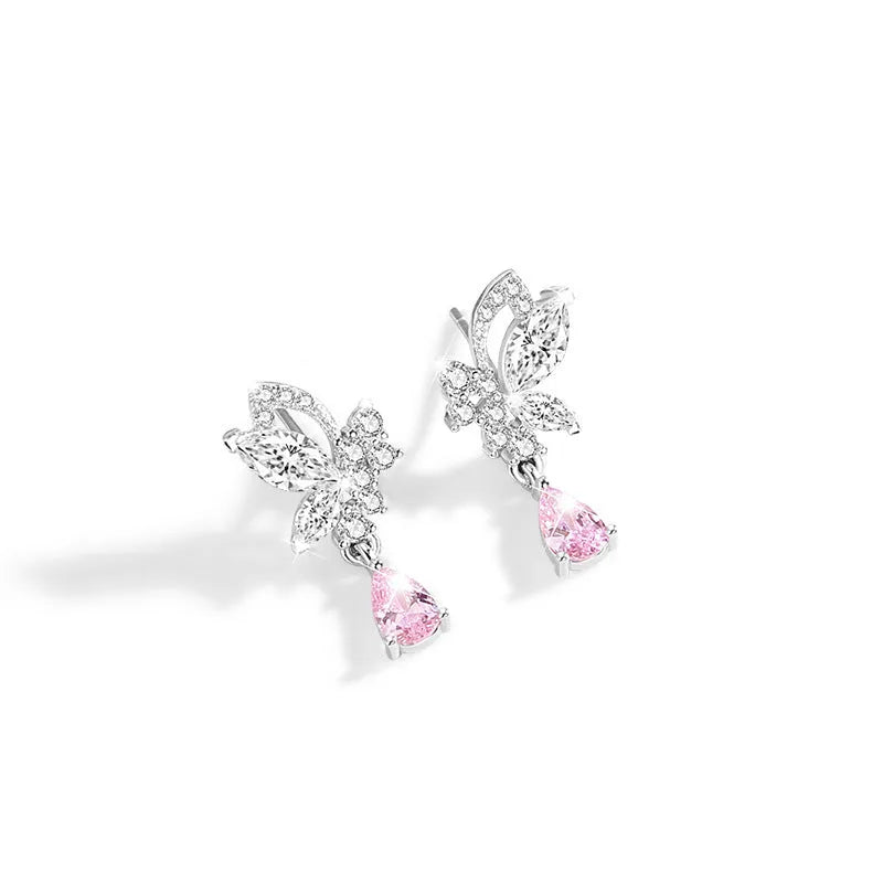 Silver stud earrings with butterfly shape and crystal accents in colour E0141
