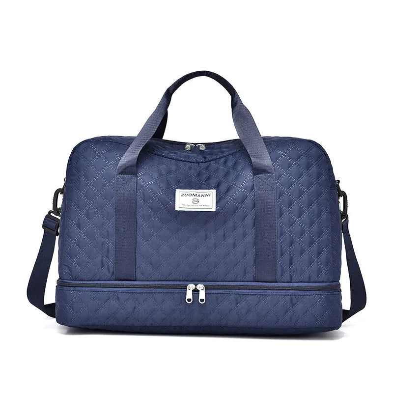 Large Oxford cloth travel bag in a solid colour showing its spacious design and street style details.