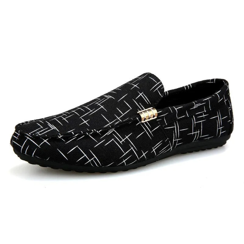 Canvas casual lazy shoes with cloth upper and rubber sole in black, side view