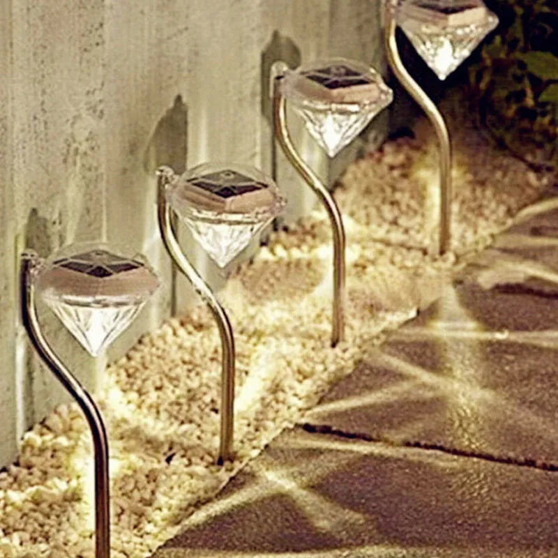 Solar powered diamond shaped garden LED light with solar panel for outdoor automatic evening illumination