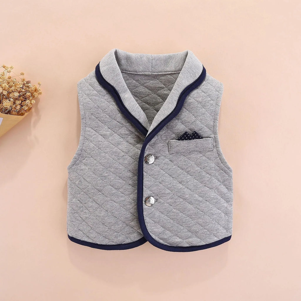 Baby boy British-style cotton onesie in navy blue with long sleeves and single-breasted front