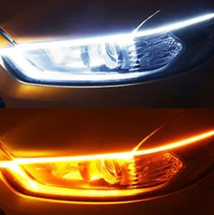 60cm ultra-thin car LED tear light guide strip in white yellow two-colour mode on a dark background