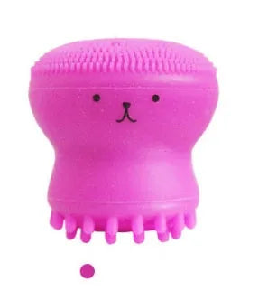Cartoon octopus silicone wash brush in pink for manual facial cleansing and massage