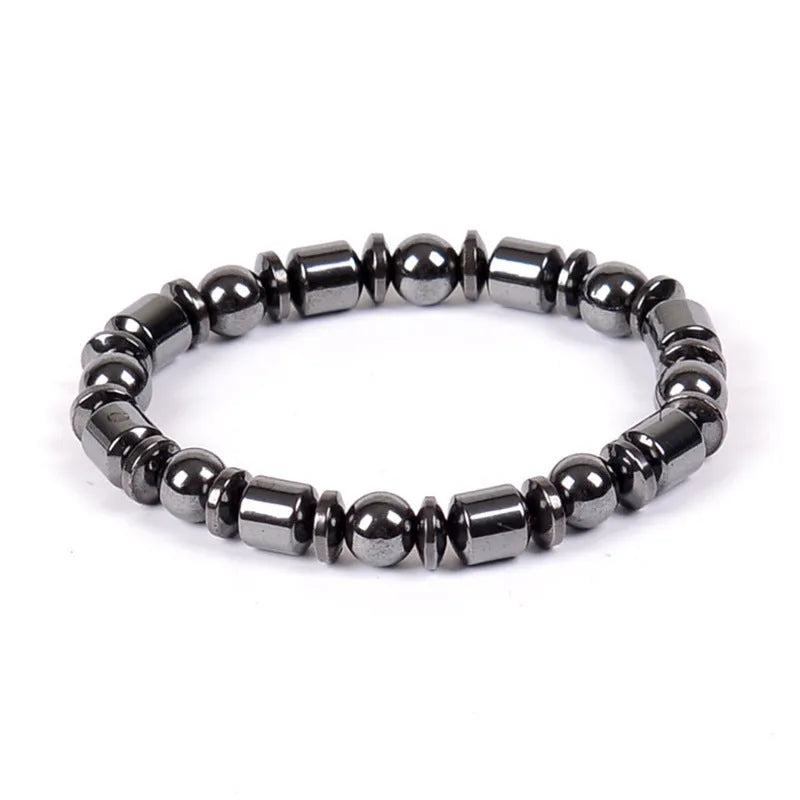 Black pentagram symbol magnetic bracelet with magnetite and hematite stones on a stretch band.
