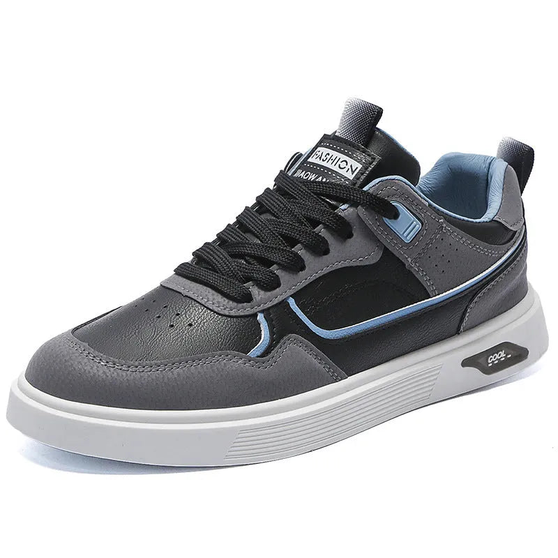 Men's beige low-top canvas board shoes with leather stitching details on a white background.