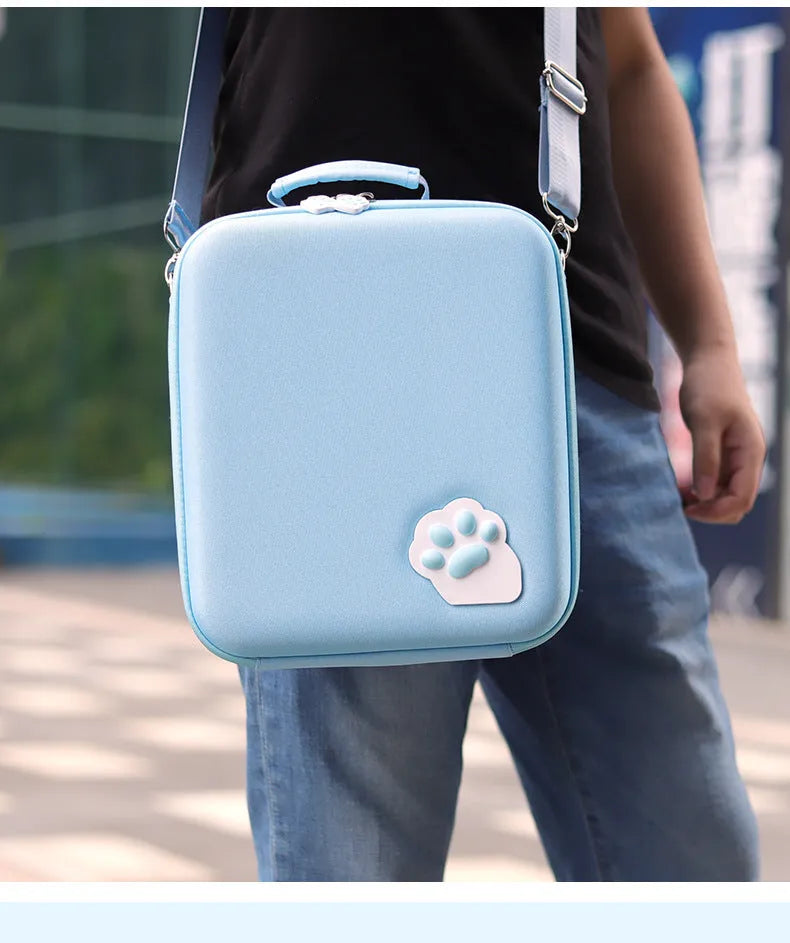 Nintendo Switch storage bag with cat claw print, showing game cartridge slots and diagonal shoulder strap.