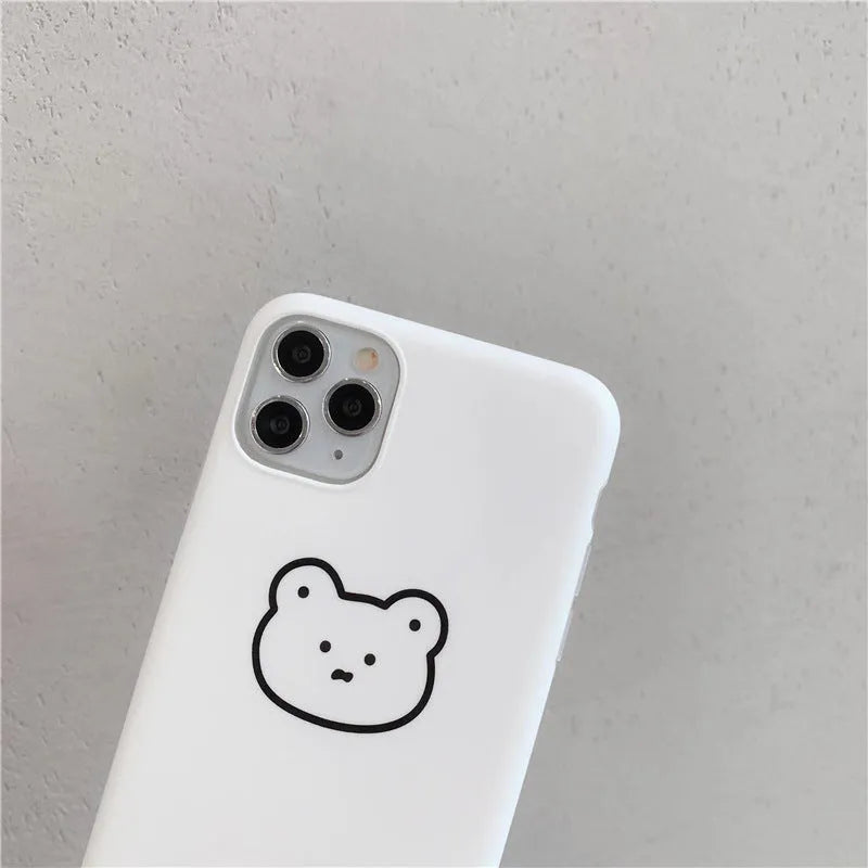 Silicone iPhone case with Korean bear cartoon design showing back and side coverage