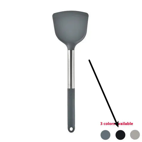 Black silicone kitchen utensil set with 12 tools stored in a rotating plastic storage bucket on a worktop.
