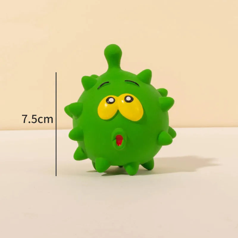 Four colourful squeaky dog balls with textured surfaces and cute faces