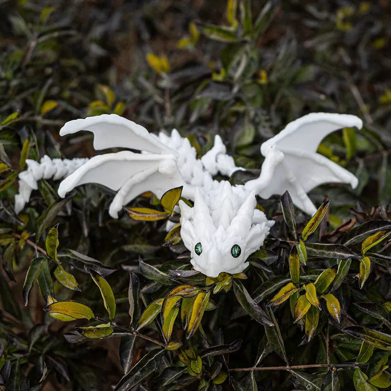 Red and gold PLA flying dragon wings decoration toy measuring 25cm wide.