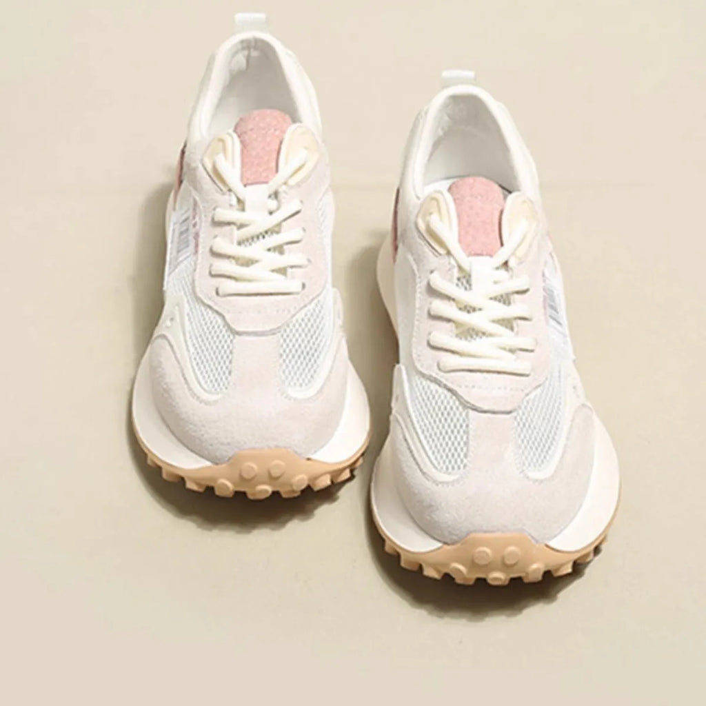 Women's grey and pink retro sneaker with low-top design and flat rubber sole