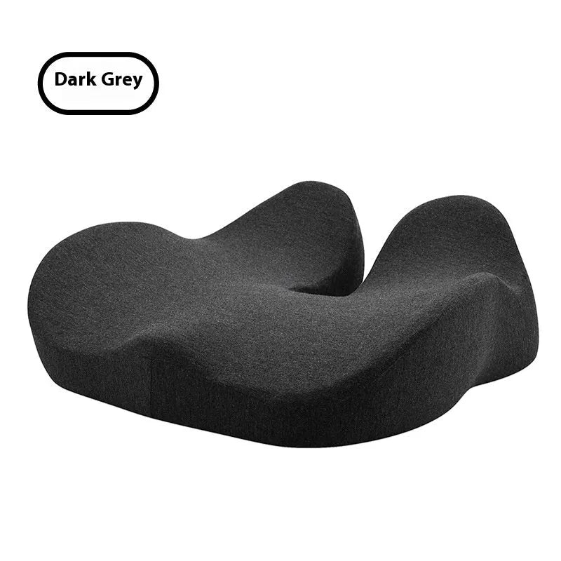 Solid colour memory foam office chair cushion in light grey on a chair.
