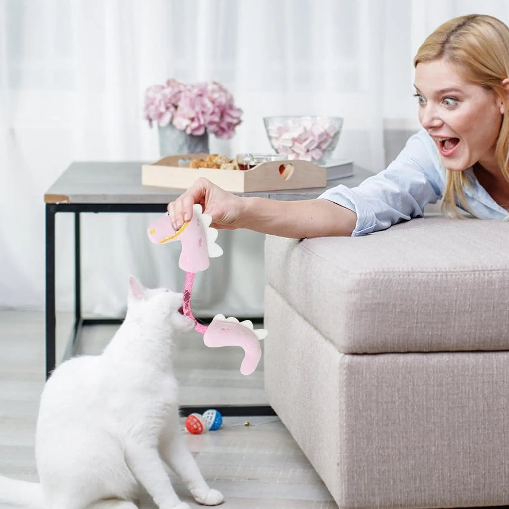 Cat toy bundle with chew toy, catnip ropes, springs and kicker in pink, purple or yellow measuring 23 by 6 cm
