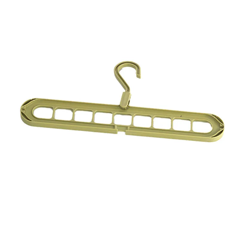 Multifunctional plastic hanger with nine holes for folding trousers, shown in beige