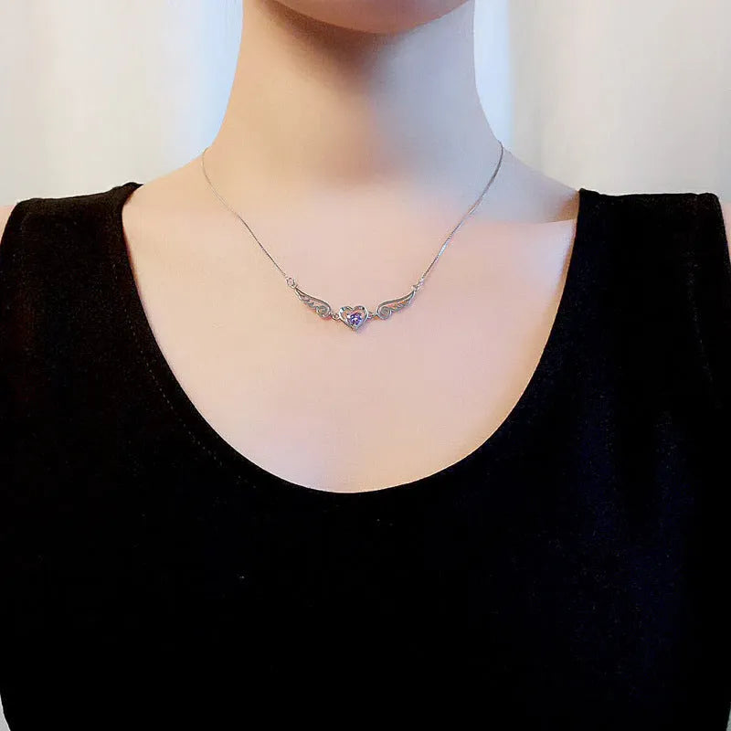 Angel wings necklace in 925 sterling silver with purple crystal heart pendant and 45cm link chain