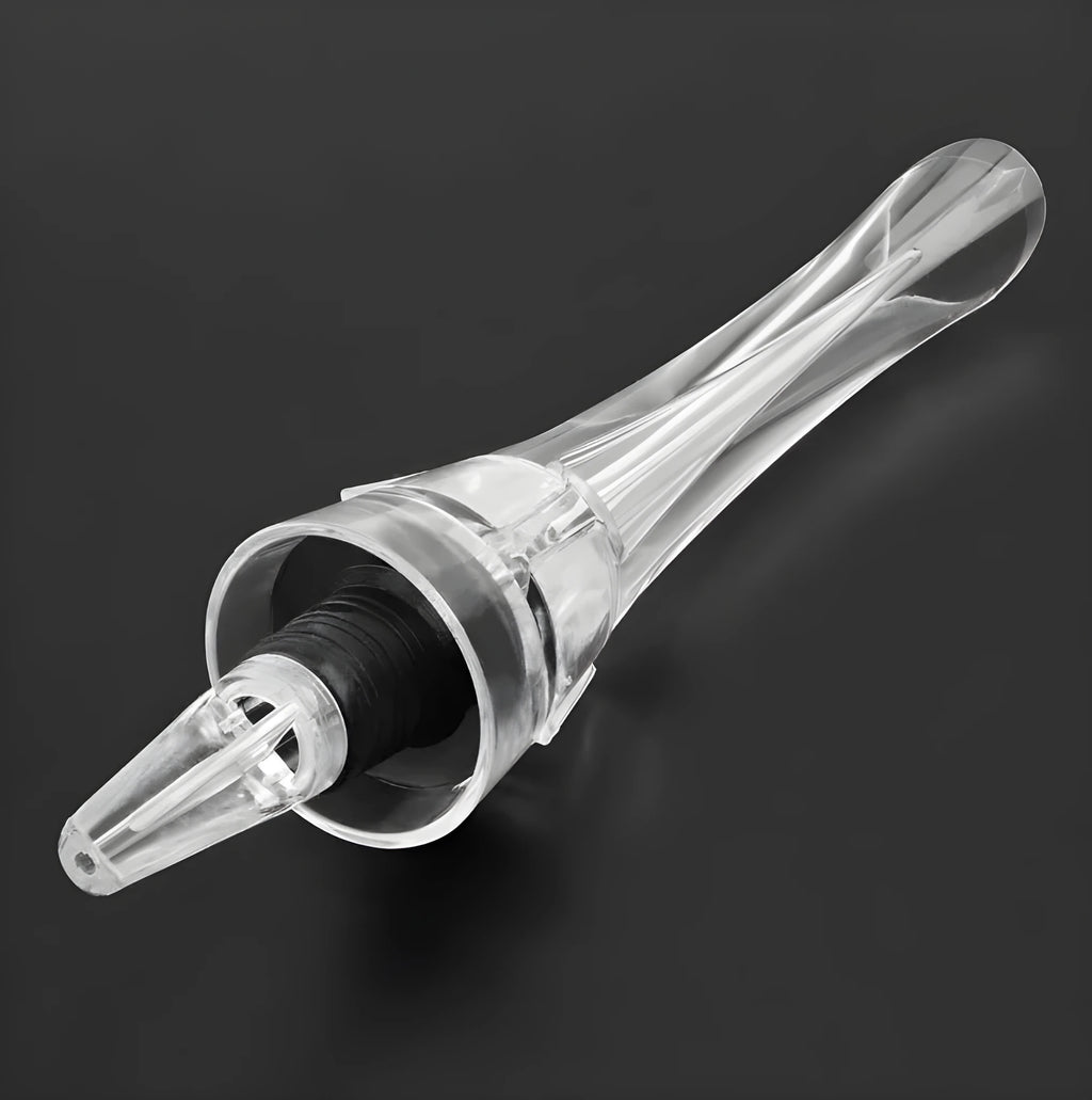 Compact clear acrylic wine aerator with a stainless steel filter, measuring 16cm long.