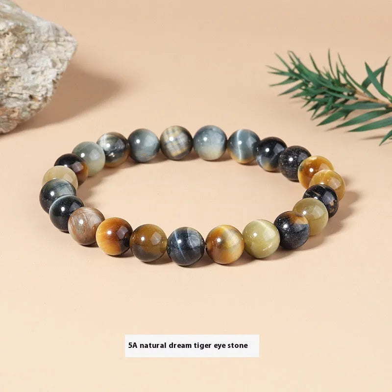 Natural tigereye crystal bracelet with yellow tiger eye beads approximately 8mm diameter on elastic cord