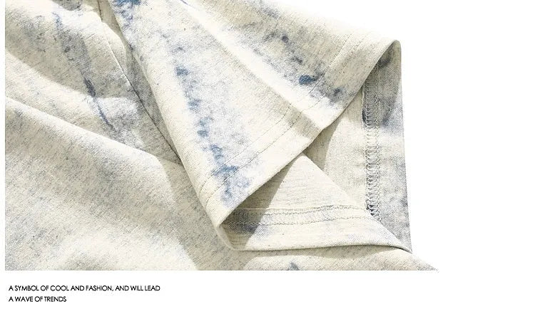 Grey tie dye printed t-shirt with short sleeves and round neck collar in loose fit