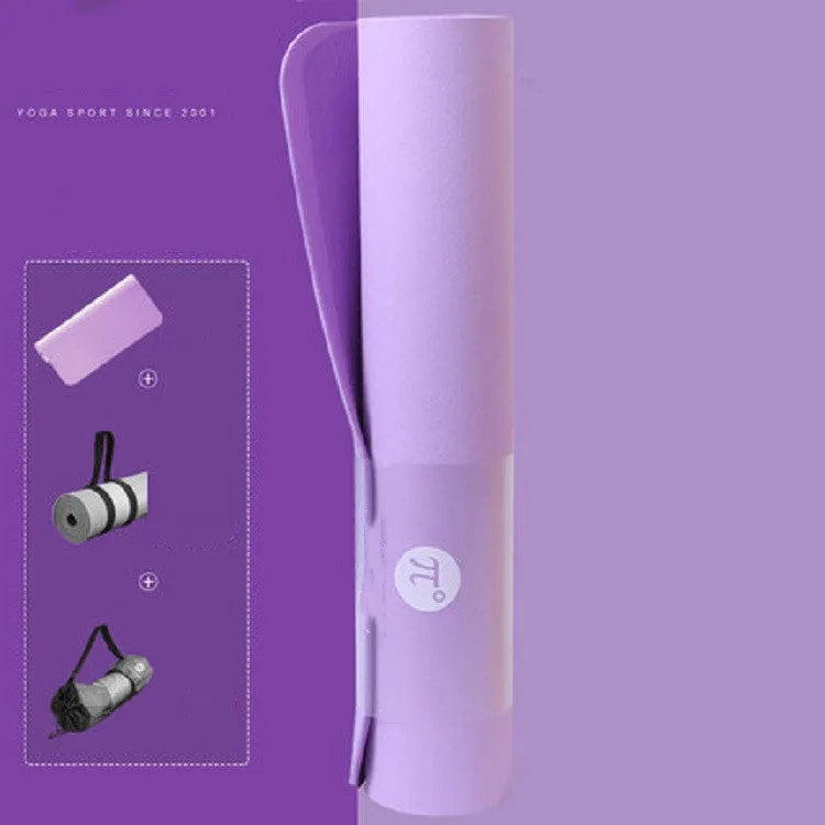 Paido TPE yoga mat in Pink Grey colour rolled out on a wooden floor with a yoga block nearby