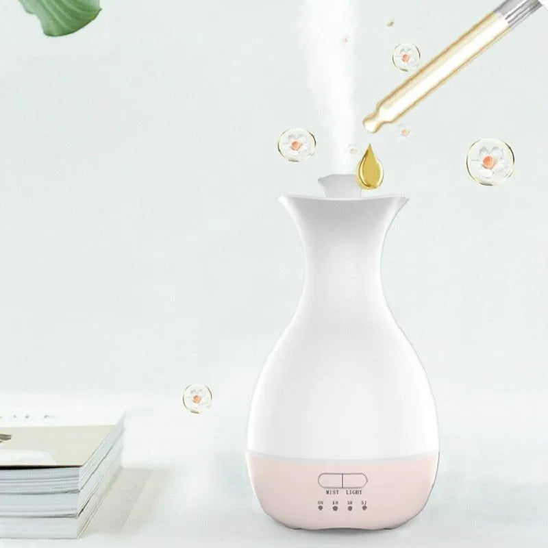 White or pink ultrasonic air humidifier and essential oil diffuser with colourful night light and 200ml water tank