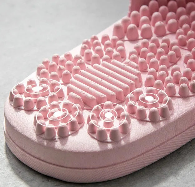 Reflexology acupressure slippers in EVA material with 3D massage particles, available in blue, grey, light blue, pink, purple