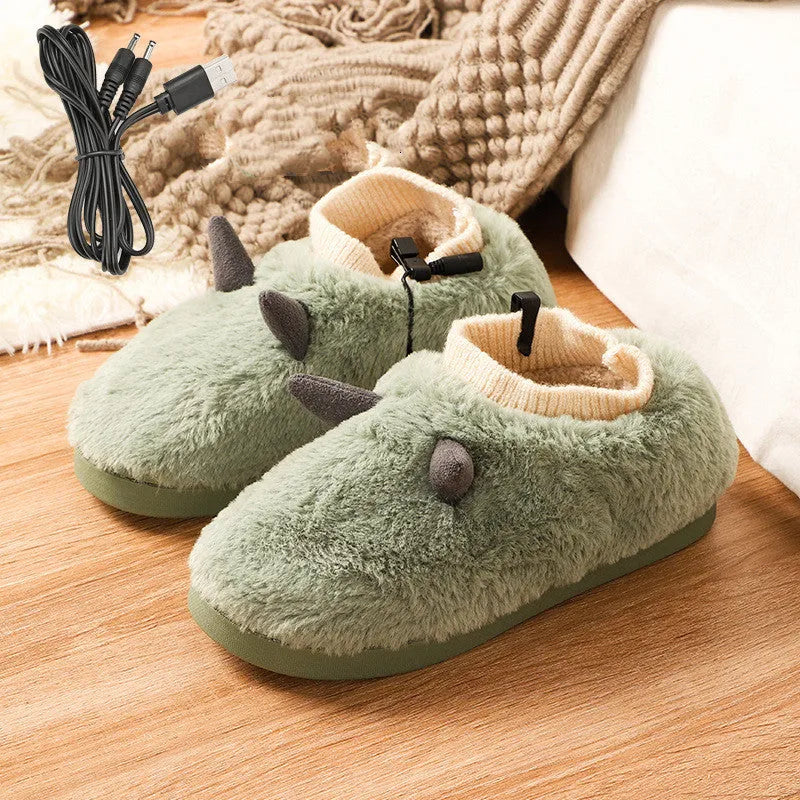 USB electric foot warmer slippers in grey with a connected USB cable on a wooden floor.