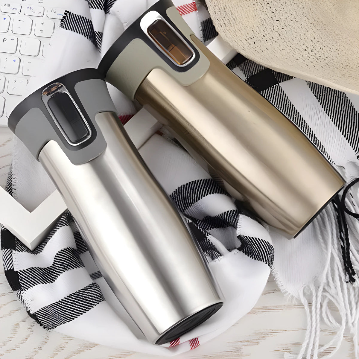 450ml vacuum insulated stainless steel travel mug with leak-proof push-button lid, shown in black, blue, or true colour