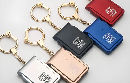 Bluetooth dual SIM adapter keychain for iOS with Nano SIM slot and Micro USB port.