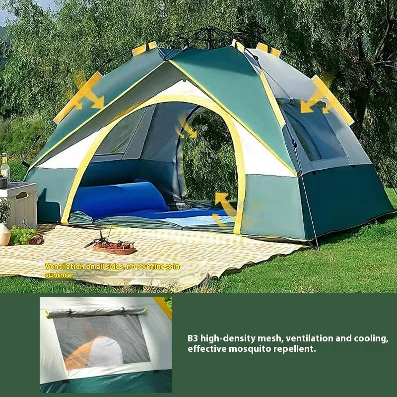 Dark green and silver automatic pop-up camping tent pitched in a field.