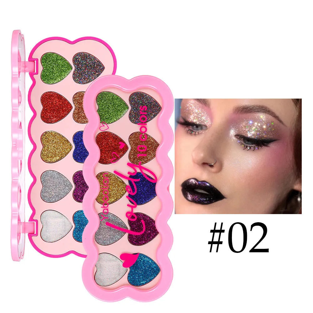 Pearlescent Heart ten-color sequins eye shadow palette showing shades of white, beige, pink, purple, brown, blue, black, royal blue, maroon, and coral.