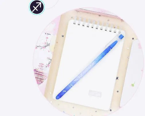 Box of 12 constellation-themed quick-drying gel pens with plastic bodies and coloured caps
