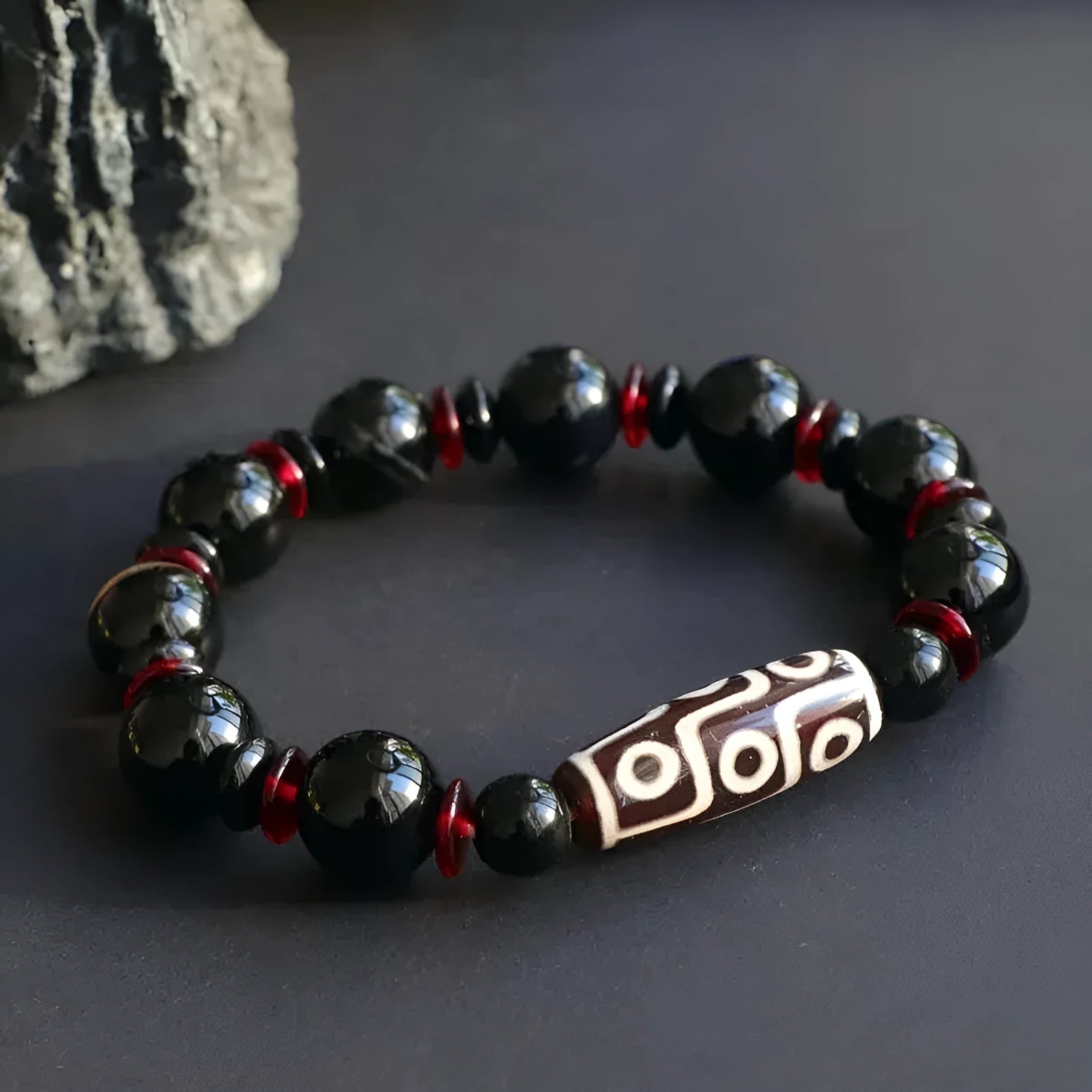 Hand-woven black agate Dzi bead bracelet with 11mm geometric chalcedony beads