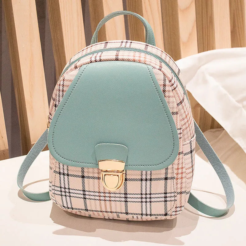 Diagonal cut one shoulder phone bag in PU fabric available in five colours.