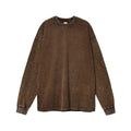 Man wearing a vintage washed batik colour cotton long sleeve pullover in a loose fit.