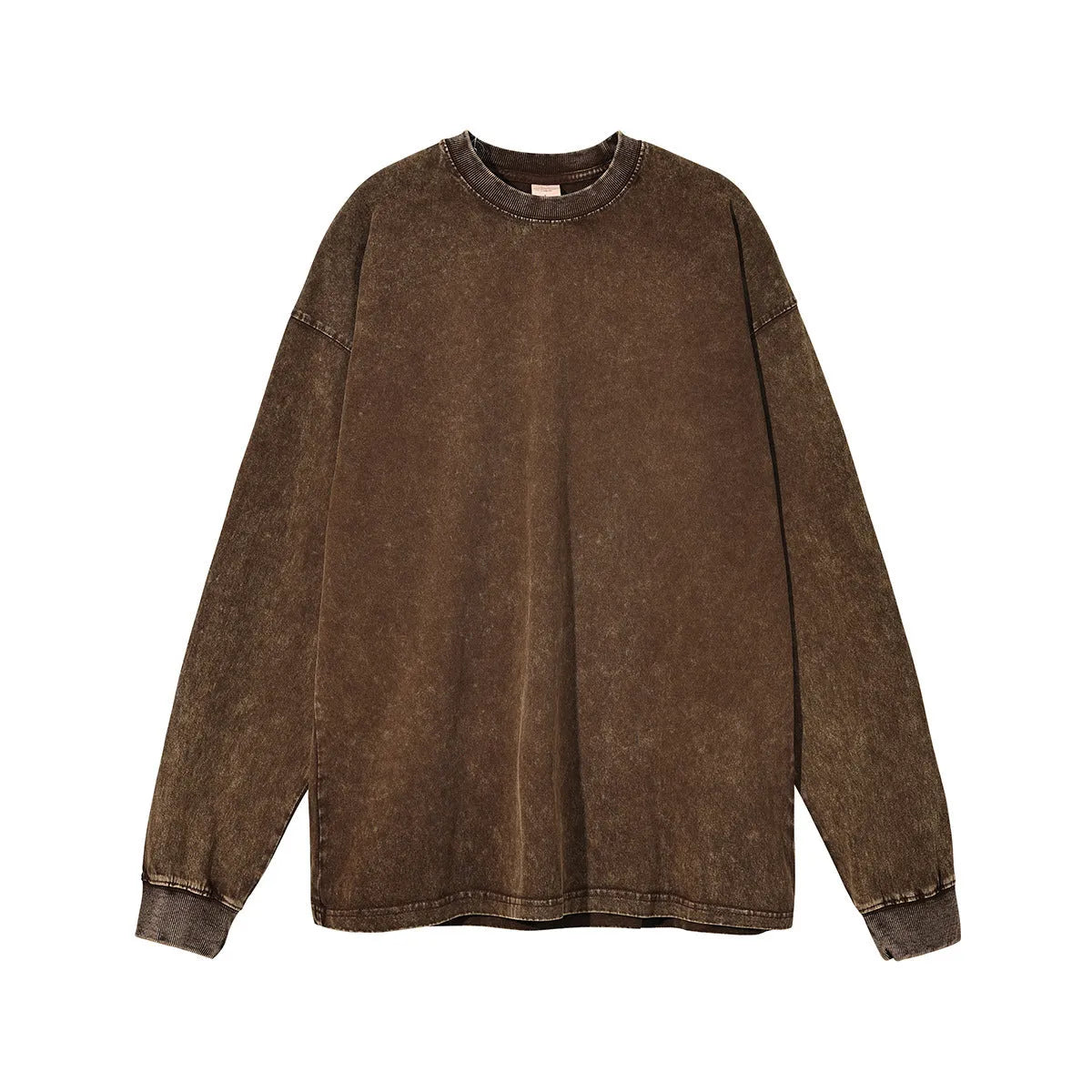 Man wearing a vintage washed batik colour cotton long sleeve pullover in a loose fit.