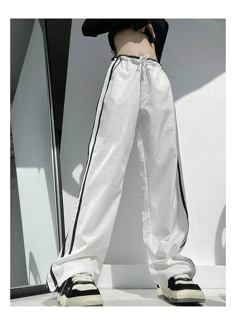 Women's loose straight trousers with contrast ribbon parallel bars detailing in white and navy blue options