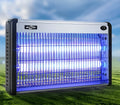 Electric mosquito killing lamp with UV light and high-voltage grid for indoor fly and mosquito control.