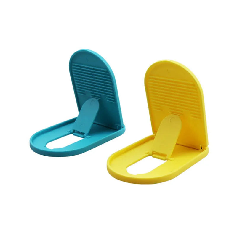 A plastic mobile phone stand with a lazy bracket mechanism shown in one of six colour options.