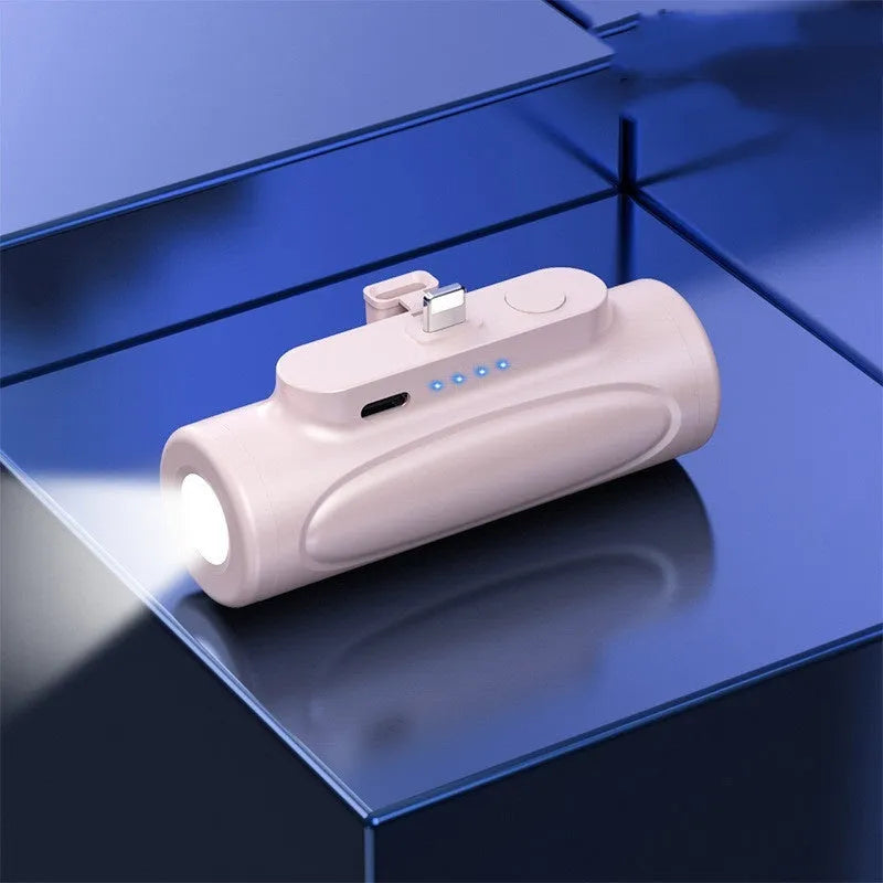 Black creative power bank with integrated LED flashlight, showing USB-C port, dimensions 83x27x41mm.