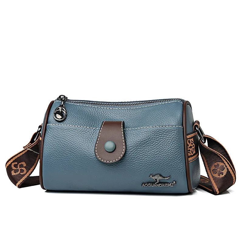 Women's top grain leather crossbody bag in blue, black, or khaki with horizontal square shape and inner pockets.