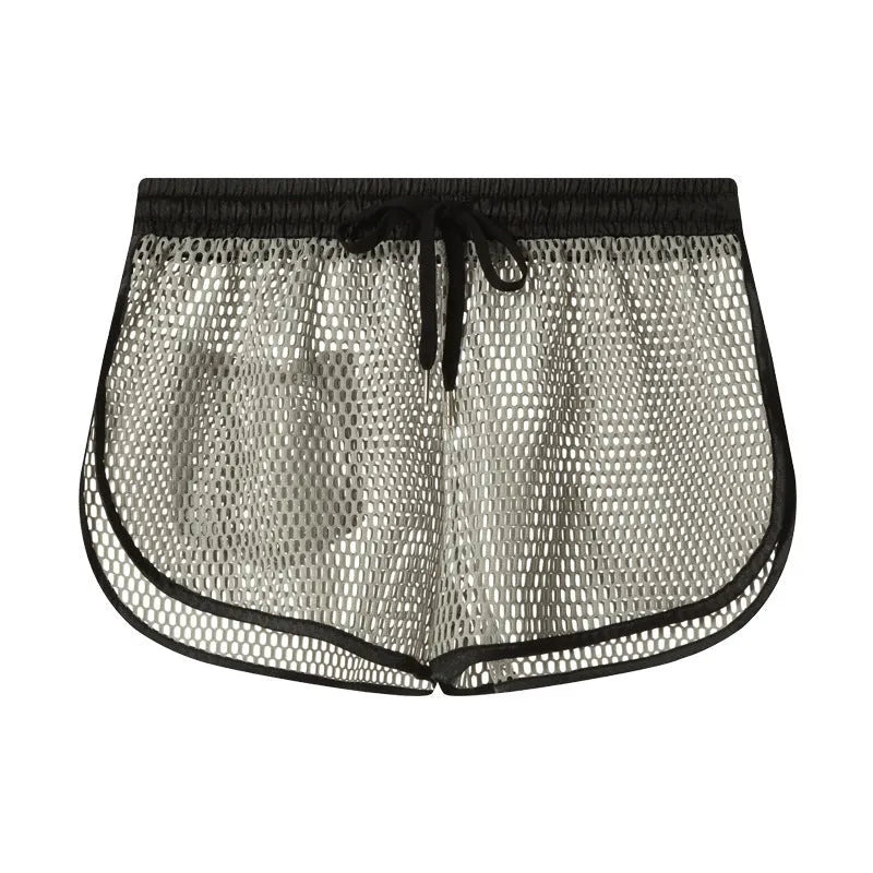 Men's solid colour loose boxer shorts in black, white, gray, or red on a size chart